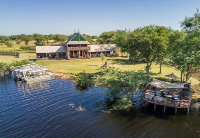 African bushveld surrounds the swimming pool