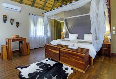 Large bedrooms with mosquito nets