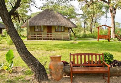 River lodge layout and gardens with family bungalow