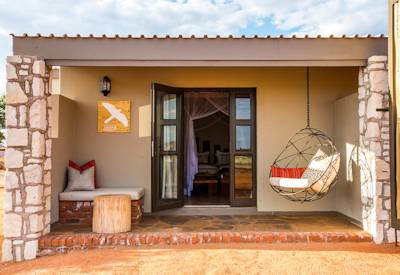 Lodge private verandah with twin beds