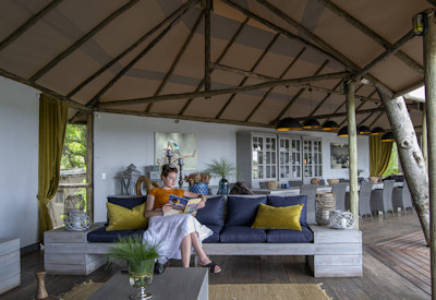 Open air lounge area with views of the Kwando River
