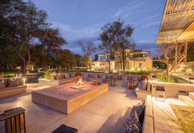 Mokuti at night with firepit
