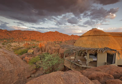 Thatched suites with views of the Huab Rivers