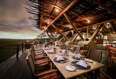 Lounge and dining areas with views out over the Ongava Reserve