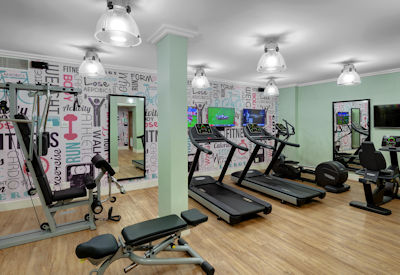 Well equipped gym area with crystal steam rooms