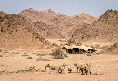 Hoanib Skeleton Coast Camp Meru tents granite rocks desolate wilderness Namibia safari