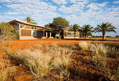 Kalahari Anib Lodge stylish accommodation sundowner drive Highlights of Namibia safari
