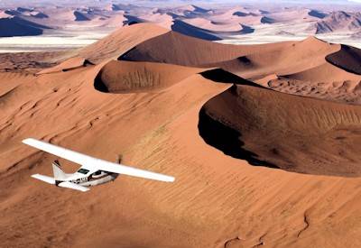 Sossusvlei 300m world's highest dunes aerial view Sesriem vehicle excursion Namibia fly-in