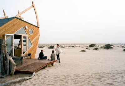 Shipwreck Lodge iconic ship-shaped cabins family Skeleton Coast Northern Namibia safari