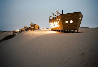 Shipwreck Lodge iconic ship-shaped cabins Skeleton Coast Northern Namibia Journey