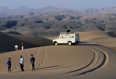 Kunene River morning boat trip crocodile birdlife Namibia Angola border Skeleton Coast fly-in