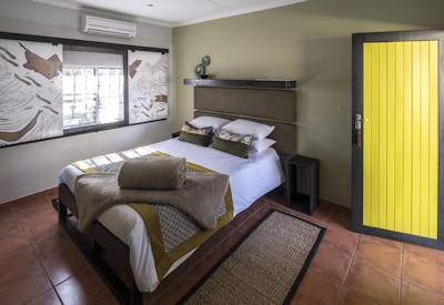 Namib Desert Lodge en-suite bedroom fossilised dune foot Sossusvlei Shuttle Namibia