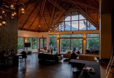 Amakoro Songa Lodge lounge stunning Volcanoes National Park views Rwanda