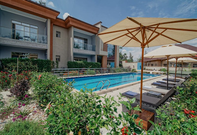 Heaven Boutique Hotel solar-heated saltwater pool sun loungers outdoor yoga deck Rwanda