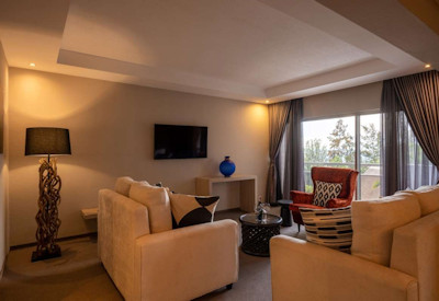 Hôtel des Mille Collines suite separate lounge satellite TV Kigali Rwanda