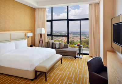 Kigali Marriott Hotel absolute 5-star luxury floor-to-ceiling windows marble shower Rwanda