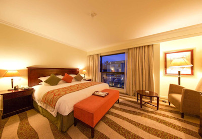 Kigali Serena Hotel family-friendly rooms children's dining babysitting Rwanda