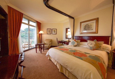 Lake Kivu Serena Hotel classic luxury en-suite bedroom balcony Lake Kivu views Rwanda