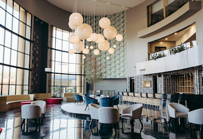 Mantis EPIC Hotel Suites main lounge Nelson's Bar sundowner savannah views Rwanda