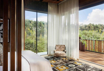 One&Only Gorillas Nest stunning Virunga volcanic peaks views eucalyptus Rwanda