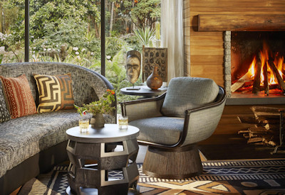One&Only Gorillas Nest lounge large fireplace Imigongo rugs al fresco deck Rwanda