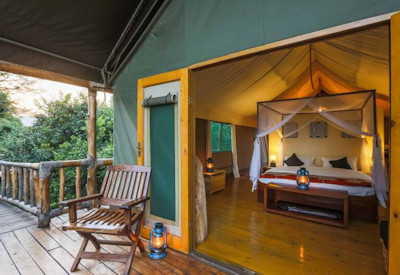 Ruzizi Tented Camp large tented suite queen bed shaded veranda campaign chairs Rwanda