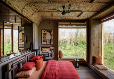 Singita Kwitonda Lodge spacious en-suite suite indoor outdoor shower fireplace Rwanda