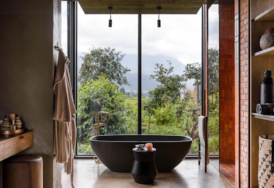 Singita Kwitonda Lodge magnificent en-suite bath indoor outdoor shower Rwanda