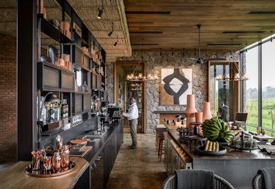 Singita Kwitonda Lodge dining room wine boutique farm-to-table Rwanda