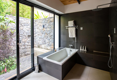 The Retreat By Heaven en-suite rain shower vanity area Kigali Rwanda