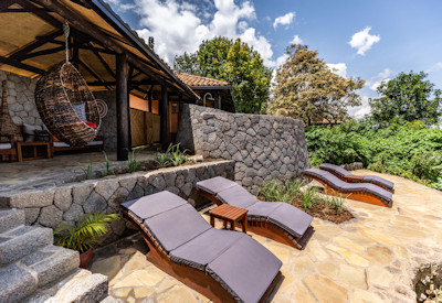 Virunga Lodge outdoor relaxation wrap-around veranda Lakes Ruhondo Bulera Rwanda