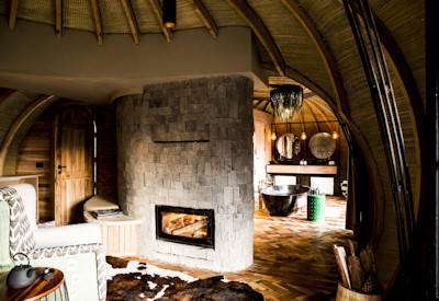 Wilderness Bisate central guest area lounge fireplace reforestation tree nursery Rwanda