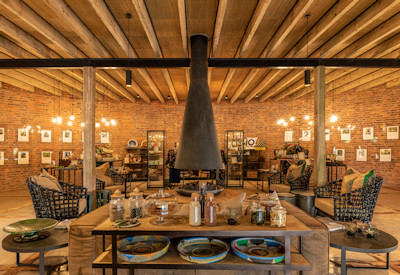Wilderness Bisate lounge indoor dining room vegetable garden farm-to-table Rwanda