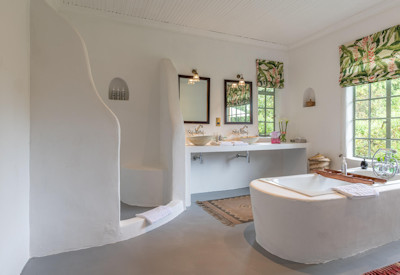 Wilderness Sabyinyo Silverback Lodge spacious en-suite bathroom Virunga Massif Rwanda