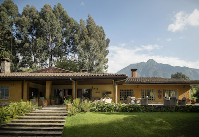 Wilderness Sabyinyo Silverback Lodge central guest area organic gardens wine cellar Rwanda