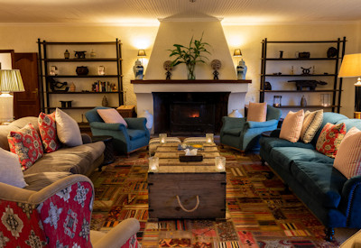 Wilderness Sabyinyo Silverback Lodge sitting room relax after gorilla trekking Rwanda