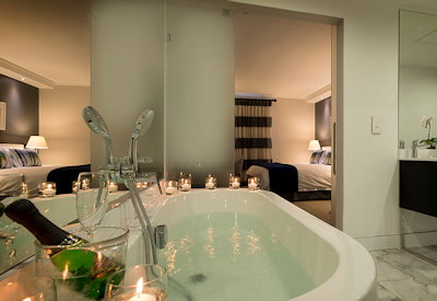 En-suite bathroom with bath