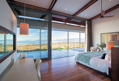 Bedroom in Grootbos Villas featuring a cozy and elegant design