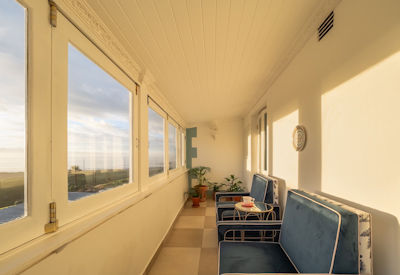 Tintswalo Summer House deluxe suite poolside patio individually styled colour palette Glencairn boutique hotel