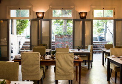 Breakfast room overlooking outdoor pool area