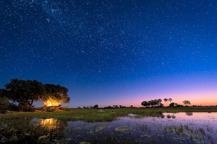 10-reasons-visit-okavango-stargazing .jpg Aerial view of Okavango Delta in Botswana with its pristine night skies and stars