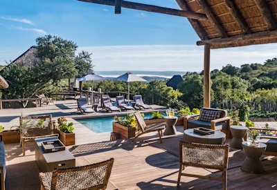 Amakhala Bukela Lodge thatched suites connected by wooden walkways Amakhala Game Reserve