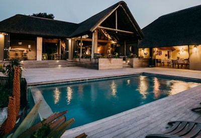 Private thatched safari suite with wooden deck at Amakhala Bukela Lodge Amakhala Game Reserve