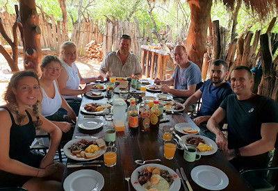 Open-fire camp cooking and outdoor dining at Amakhala Quatermain's Camp Eastern Cape