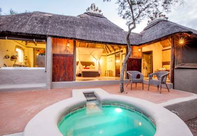 Luxury suite with private plunge pool and lounge area at Amakhala Safari Lodge Eastern Cape