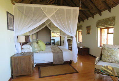 Air-conditioned stone and thatch suite at Amakhala Woodbury Lodge Amakhala Game Reserve