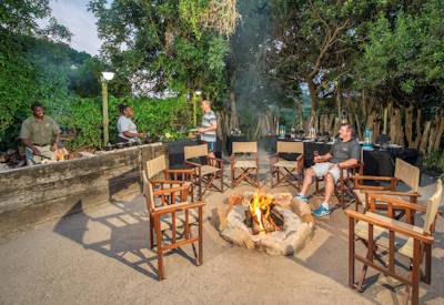 Traditional boma with firepit under African stars at Kariega Homestead Kariega Game Reserve