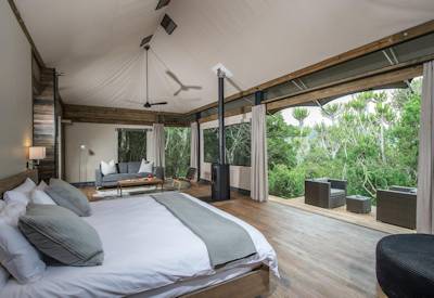 Open-plan tented suite with private viewing deck at Kariega Settlers Drift Kariega Game Reserve
