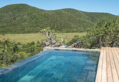 Swimming pool with sweeping Kariega Game Reserve views at Kariega Settlers Drift Eastern Cape