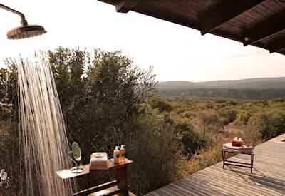Private mosaic-tiled plunge pool and outdoor shower at Kwandwe Ecca Lodge Kwandwe Game Reserve
